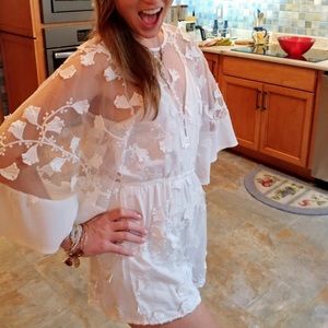 Sheer white lace wide sleeve romper